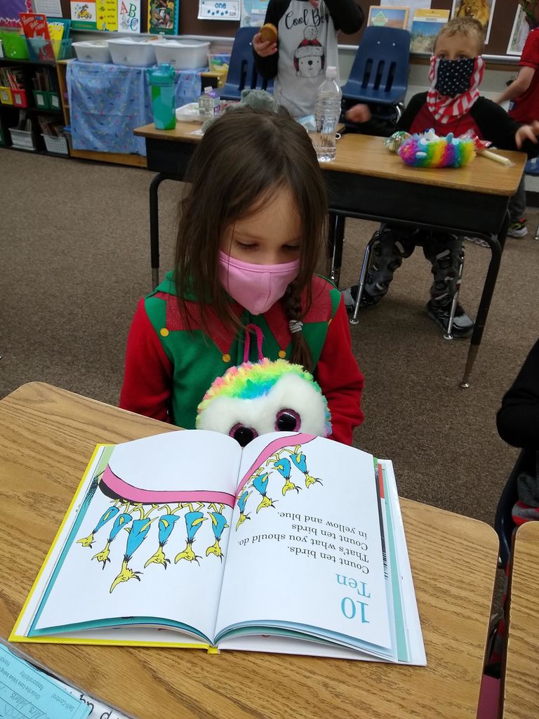 First Graders "cuddle up with a good book" in PJs!